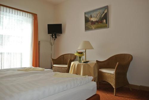 Foto de una habitación de Hotel Garni Post