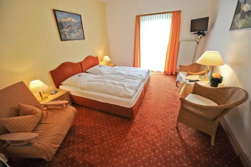 Foto de una habitación de Hotel Garni Post