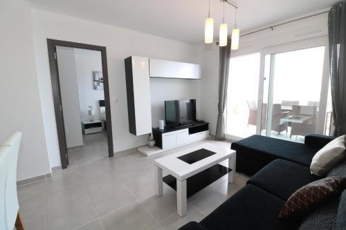 Foto de una habitación de Nova Beach Apartment
