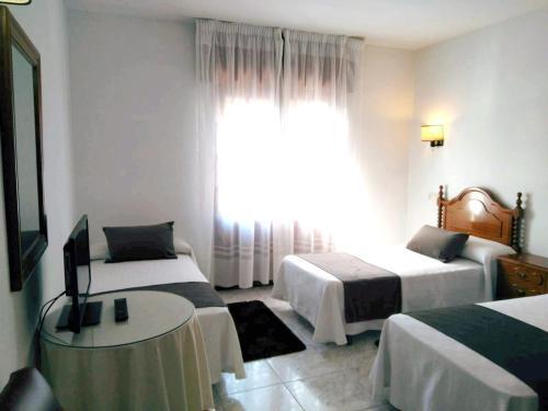 Foto de una habitación de Hostal Mourelos
