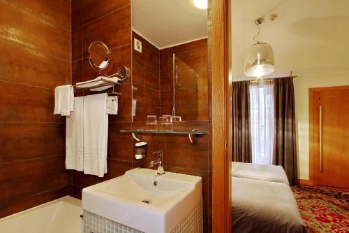 Foto del baño de Hotel Mestre de Avis
