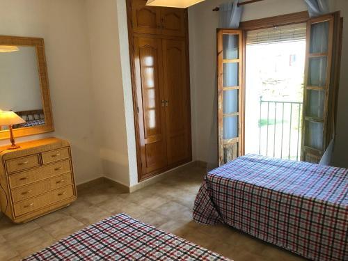 Foto de una habitación de Alquileres Vacacionales Zarzas I