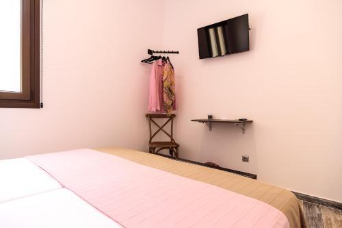 Foto de una habitación de The 8 Rooms House