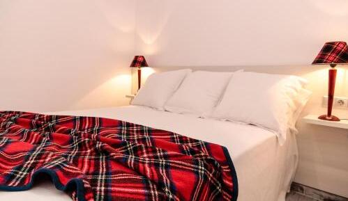 Foto de una habitación de The 8 Rooms House