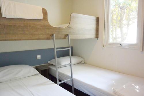 Foto de una habitación de Camping Village Torre Pendente