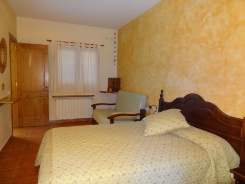 Foto de una habitación de Casa Rural El Porxo de Can Baixeres