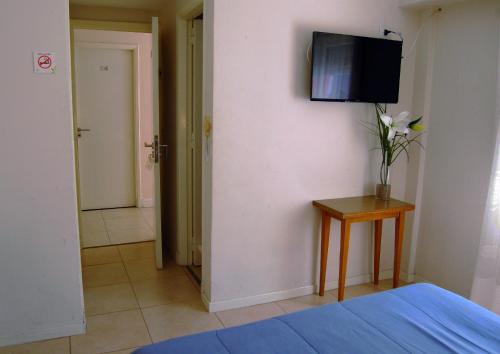 Foto de una habitación de Hotel Ayres uoetsylra