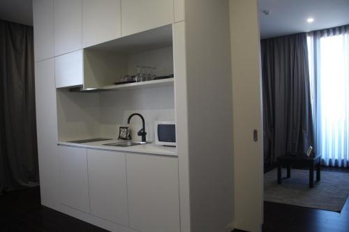 Foto de una habitación de Basto Vila Hotel