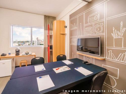 Foto de una habitación de Hotel ibis Taubate