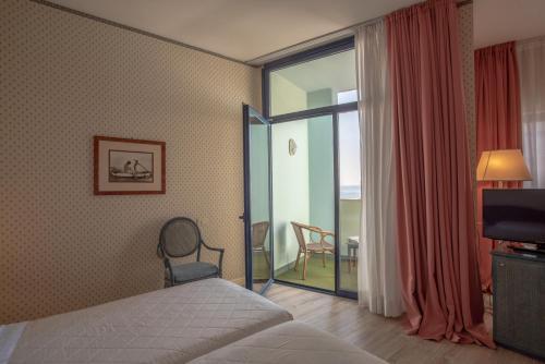 Foto de una habitación de Grand Hotel Astoria