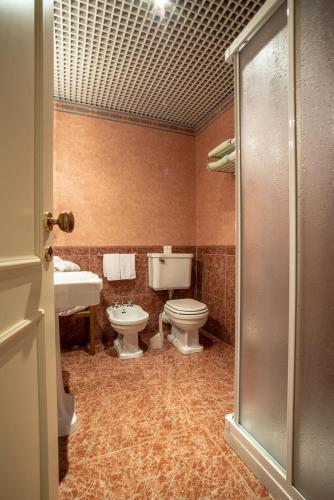 Foto del baño de Grand Hotel Astoria