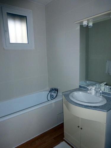 Foto del baño de Hôtel Ariane &amp;amp; SPA