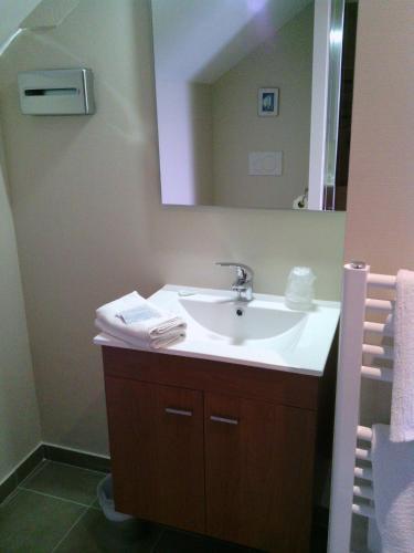 Foto del baño de Hotel La Casserole De La Baie