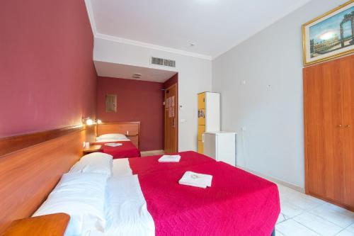 Foto de una habitación de Albergue Alessandro Palace &amp;amp; Bar