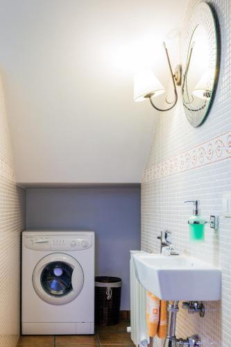 Foto del baño de Apartamentos Rurales L´Abiseu