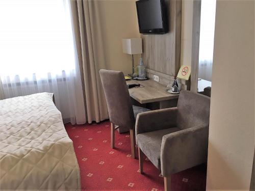 Foto de una habitación de Hotel Rosengarten