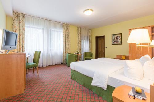 Foto de una habitación de Hotel Lohmann&amp;#039;s Kapeller Hof
