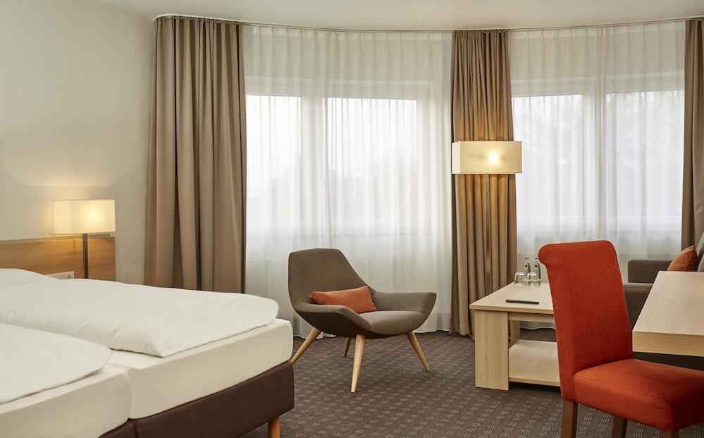 Foto de una habitación de H+ Hotel Darmstadt