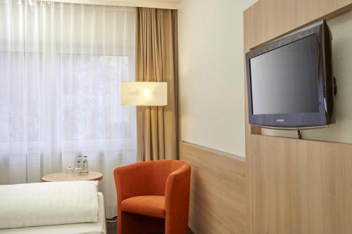 Foto de una habitación de H+ Hotel Darmstadt