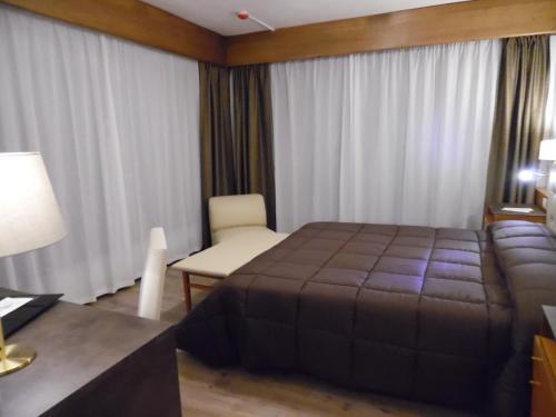 Foto de una habitación de Hotel Trento