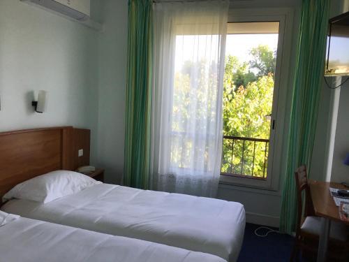 Foto de una habitación de Europ&amp;#039;Hotel Bergerac