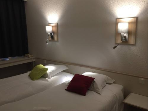 Foto de una habitación de Hôtel Les Archers