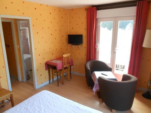 Foto de una habitación de Hôtel L&amp;#039;Orée du Bois