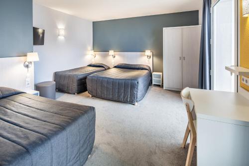 Foto de una habitación de Hôtel Acadia