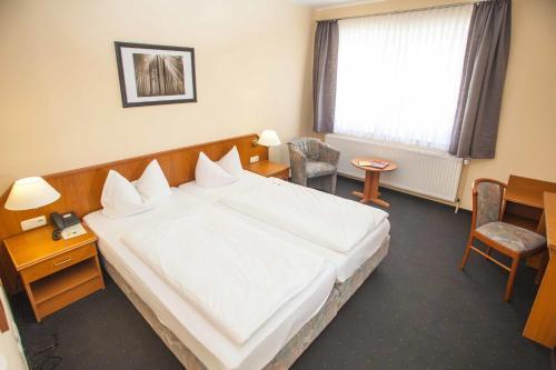 Foto de una habitación de Hotel Im Tannengrund