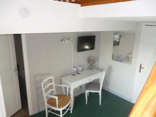 Foto de una habitación de Hôtel Picardia