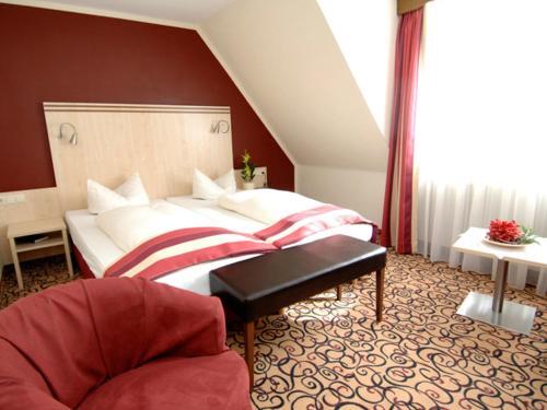 Foto de una habitación de Land-gut Hotel zum Löwen Garni