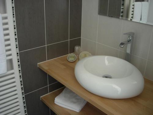 Foto del baño de Hotel Colinette