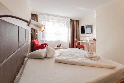 Foto de una habitación de Hotel an der Linah garni