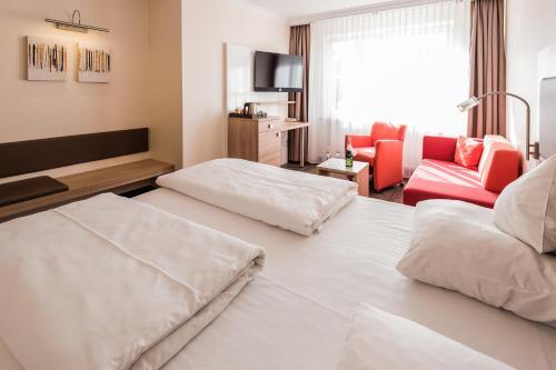 Foto de una habitación de Hotel an der Linah garni