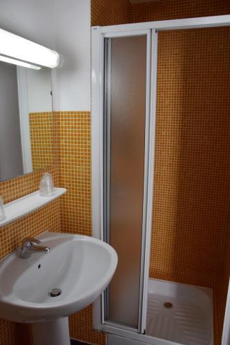 Foto del baño de Hotel Citotel L&amp;#039;univers