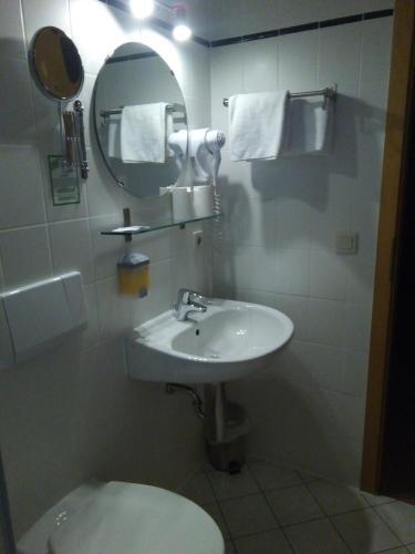 Foto del baño de Hotel am Schloss