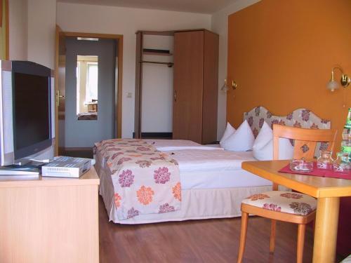 Foto de una habitación de Hotel am Schloss