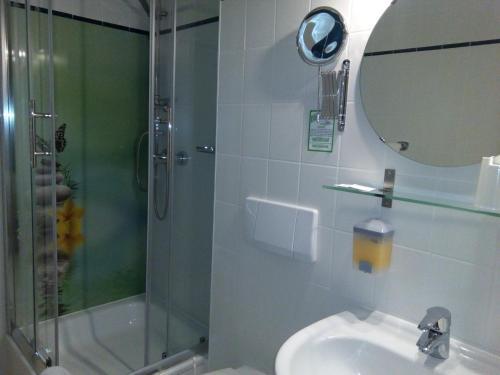 Foto del baño de Hotel am Schloss
