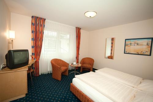 Foto de una habitación de Hotel Restaurant Hubertus