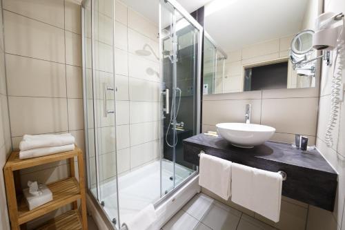 Foto del baño de Hotel am Hopfensee