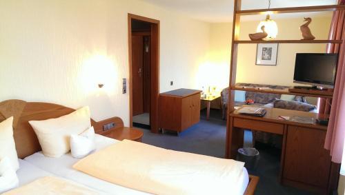 Foto de una habitación de Hotel Haus am Berg