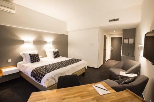 Foto de una habitación de Hotel Elewijt Center