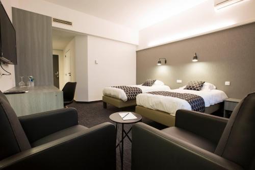 Foto de una habitación de Hotel Elewijt Center