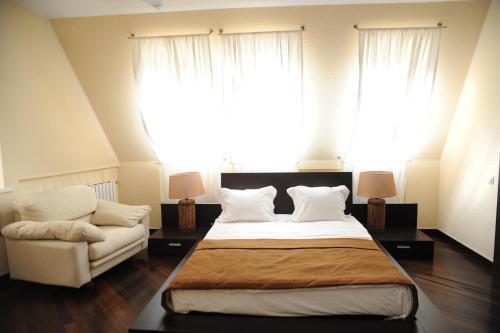 Foto de una habitación de Maldini 1899 Boutique Hotel