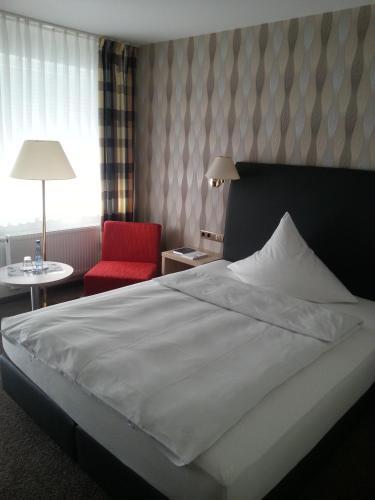 Foto de una habitación de Hotel Quellenhof