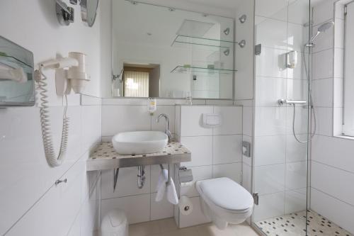 Foto del baño de Parkhotel Bilm im Glück am Stadtrand Hannovers