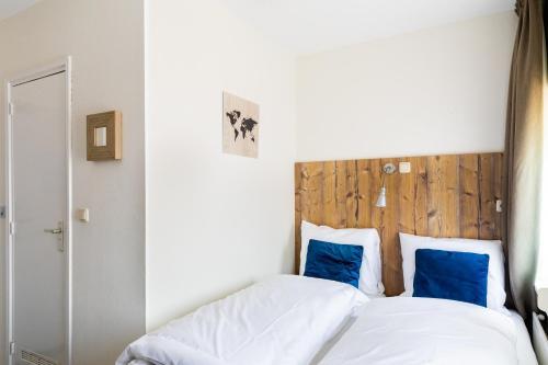 Foto de una habitación de Hotel De Kroon