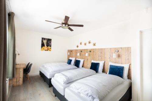 Foto de una habitación de Hotel De Kroon