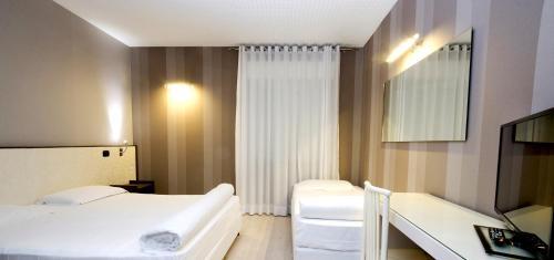 Foto de una habitación de Hotel Incontro