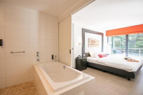Foto del baño de Cocoon Hotel La Rive